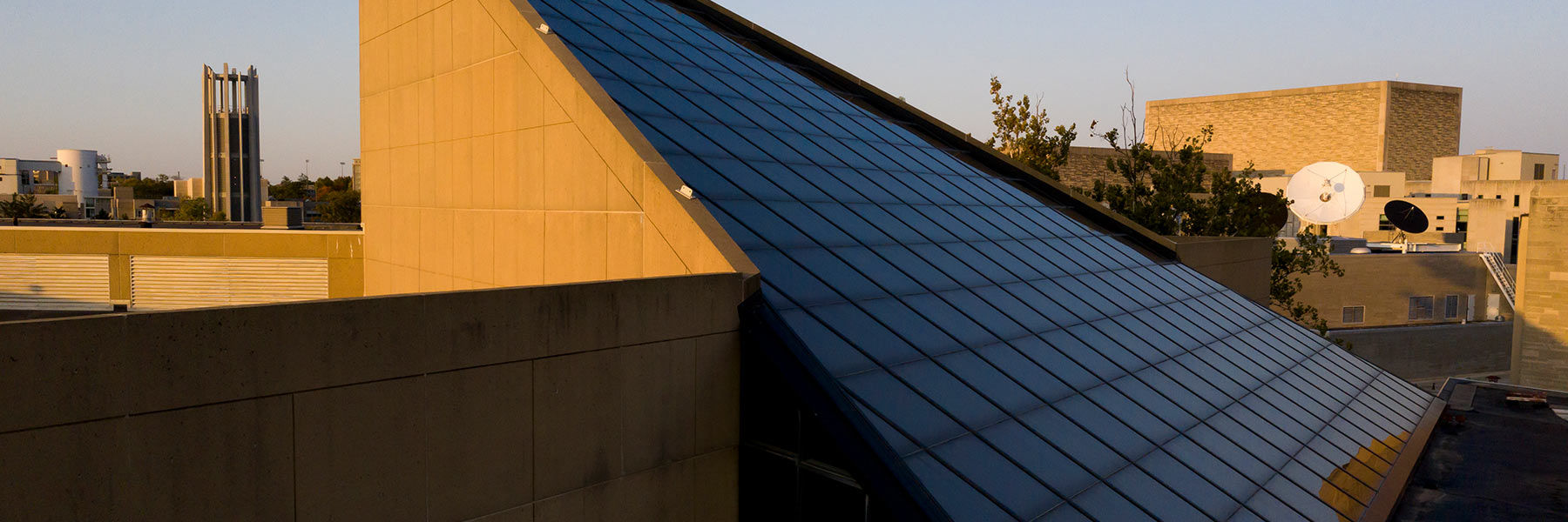 The glass roof of the Eskenazi Museum of Art at Indiana University with the Metz Bicentennial Grand Carillon in the background